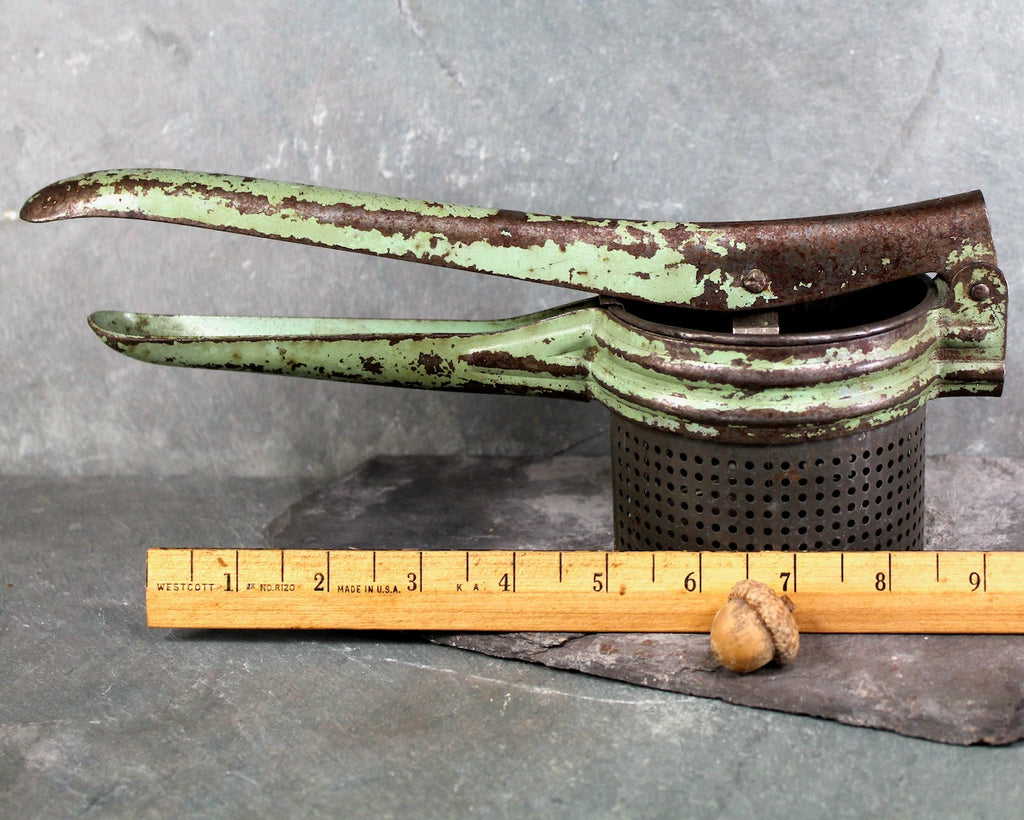 Antique potato ricer deals